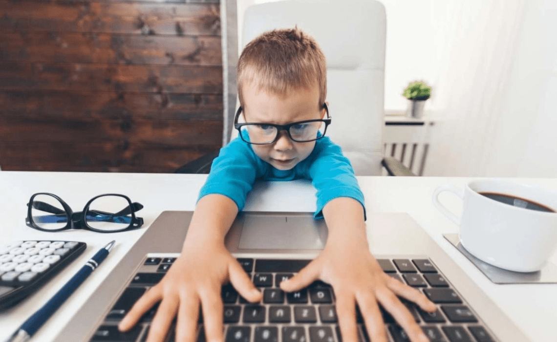 Child works on a computer